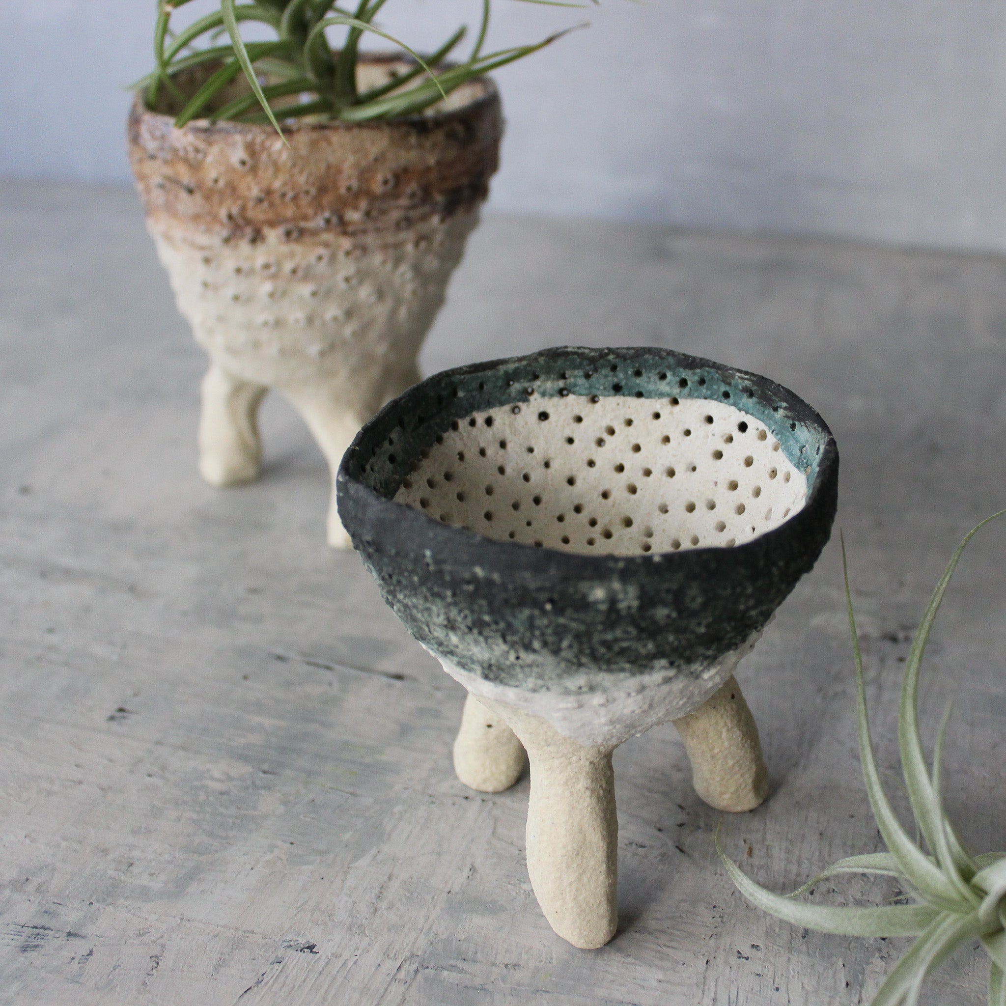 Pierced Legged Vessels