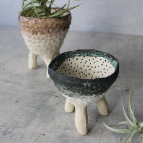 Pierced Legged Vessels
