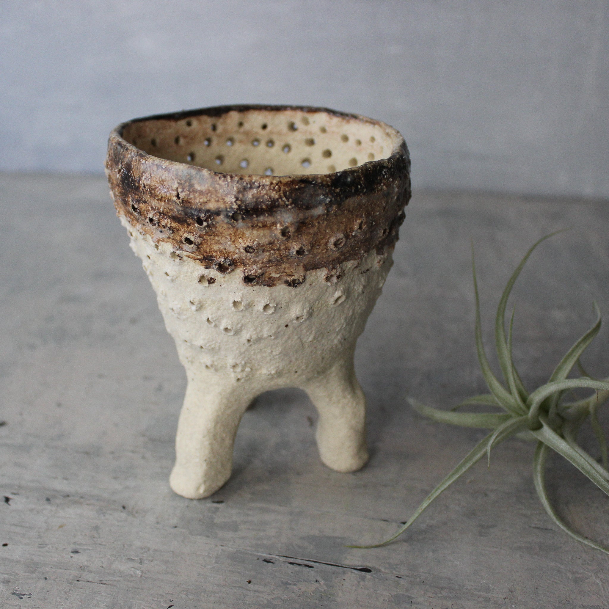 Pierced Legged Vessels