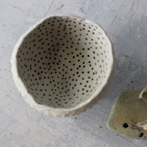 Pierced Legged Vessels