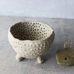 Pierced Legged Vessels