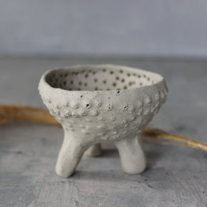 Pierced Legged Vessels
